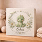 Personalized dinosaur baby memory book with name and birth date. A playful dino nursery photo album for baby memories and milestones.