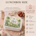 Personalized Crocodile Bento Lunch Box featuring a charming watercolor fine art print with a sweet crocodile, tropical palm trees, a toucan, frog, dragonflies, water lilies and a smiling sun. Customized with your child’s name, this practical kids lunchbox is perfect for daycare, preschool, kindergarten, school, picnics and everyday adventures.