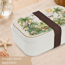 Personalized Crocodile Bento Lunch Box featuring a charming watercolor fine art print with a sweet crocodile, tropical palm trees, a toucan, frog, dragonflies, water lilies and a smiling sun. Customized with your child’s name, this practical kids lunchbox is perfect for daycare, preschool, kindergarten, school, picnics and everyday adventures.