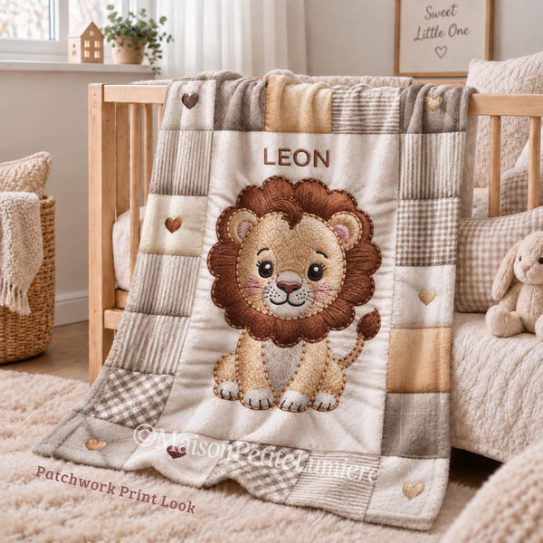 A personalized baby quilt blanket featuring a sweet lion in an heirloom-style patchwork look. Soft neutral tones – perfect for safari or neutral nurseries.
