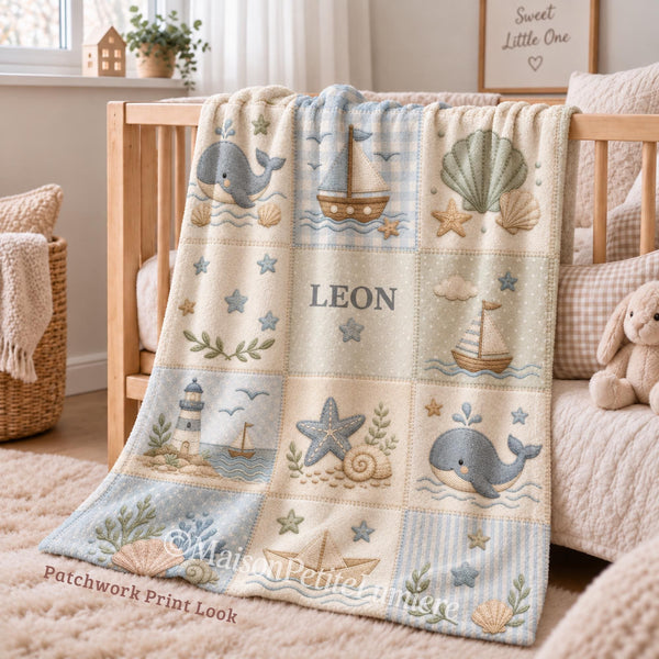 Personalized Nautical Baby Blanket – Whale, Sailboat & Seashell Design. A dreamy coastal-nursery blanket featuring whales, sailboats, seashells, starfish and a little lighthouse in soft sage, blue and cream tones — printed patchwork quilting design.
