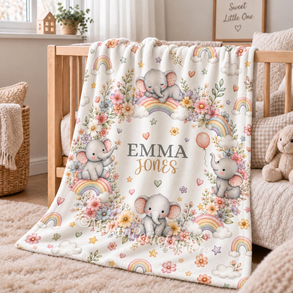 Personalized elephant baby blanket featuring adorable watercolor elephants, pastel rainbows, fluffy clouds, delicate flowers, and soft whimsical artwork. Customized with your baby’s name, this rainbow-themed blanket makes a beautiful nursery keepsake, baby shower gift, newborn present, or milestone photo prop. Perfect for creating a dreamy nursery inspired by gentle elephants, colorful rainbows, sweet florals, and timeless storybook charm.