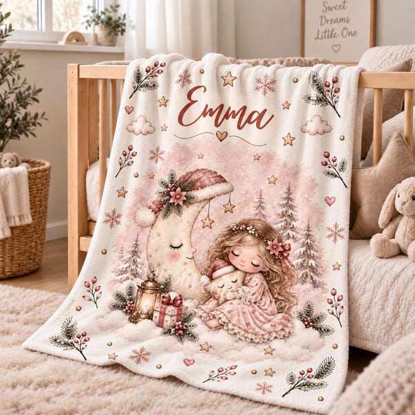 Personalized baby blanket with a girl in a pink dress cuddling a star beside a sleeping crescent moon in a Santa hat.