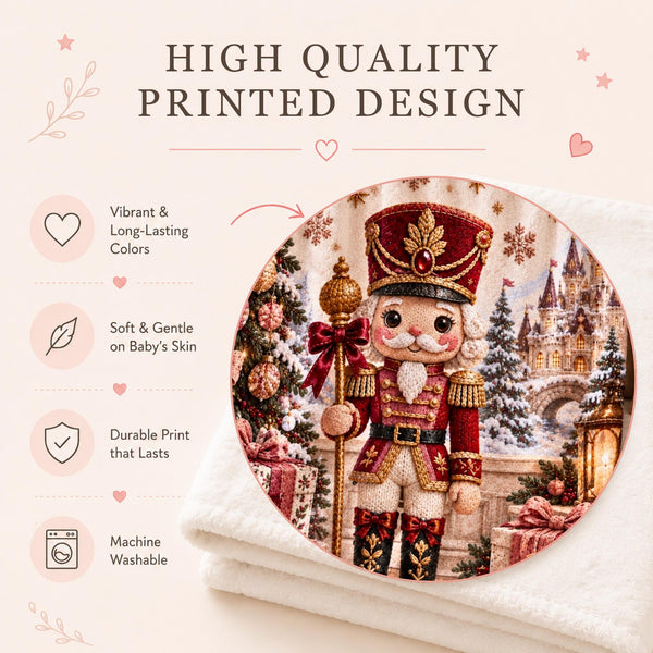 Personalized Christmas Nutcracker Baby Blanket with an embroidered-look print featuring an adorable classic Christmas nutcracker in a rich cranberry red and gold uniform, surrounded by a magical snowy Christmas landscape, fairytale castle, decorated Christmas trees, glowing lantern, presents, rocking horse, snowflakes and festive ornaments.