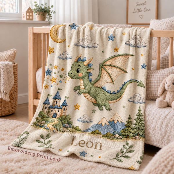 Personalized Dragon Baby Blanket with an embroidered-look print featuring a cute baby dragon, magical castle, moon, stars, and mountain scenery.